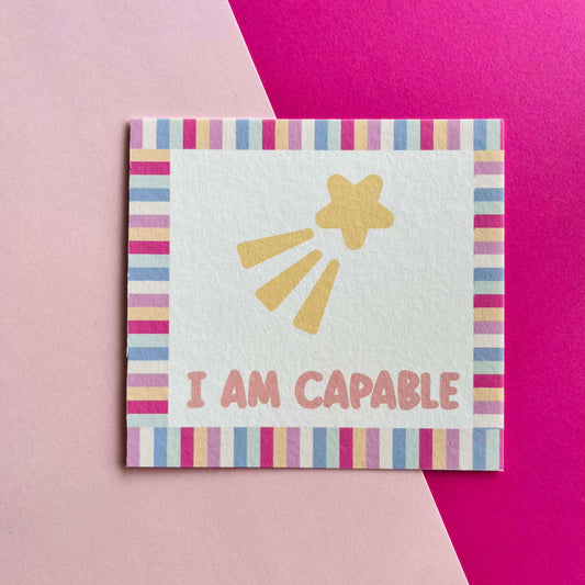 Image of Square illustrated affirmation card reads "I am capable"